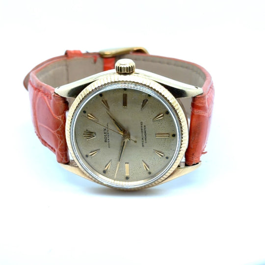 1956 Rolex Oyster Perpetual 6565 14kt Gold Champagne Dial 34mm