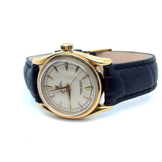 1950's Rolex Oyster Perpetual "Bombay" 6090 Yellow Gold Honeycomb Dial