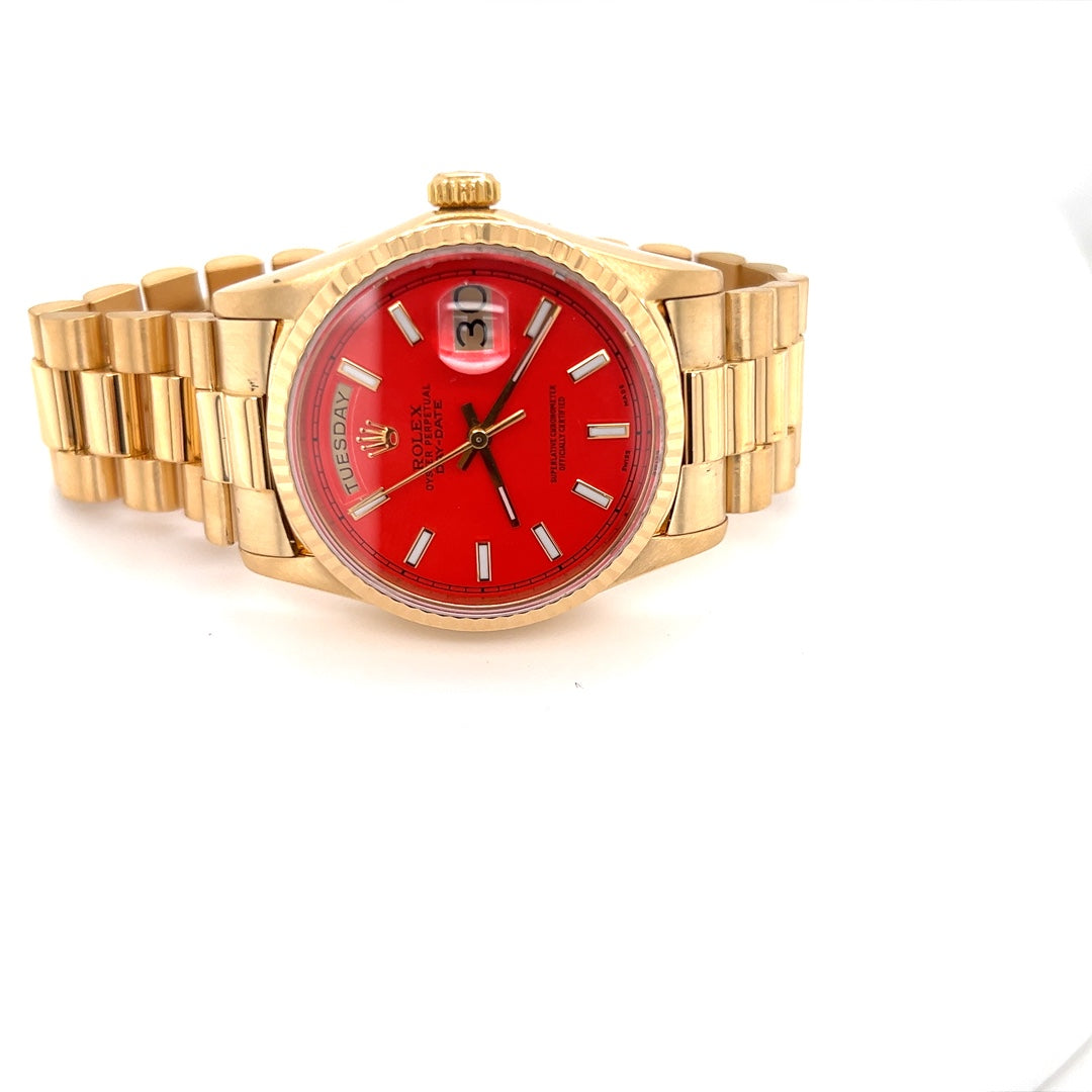 Rolex gold hotsell with red face