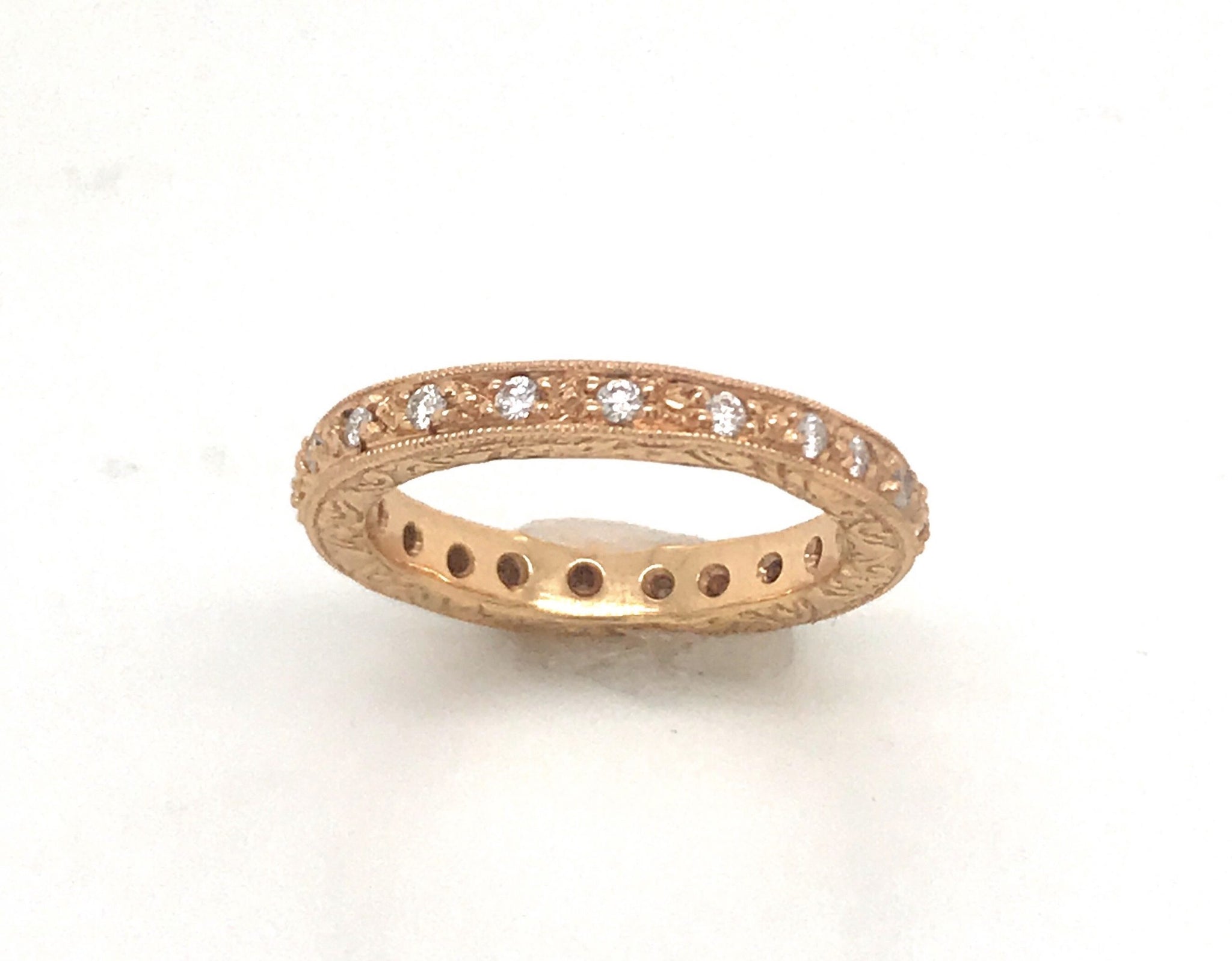 Variation test of 18kt white gold Pave' Linear Thin Eternity Band